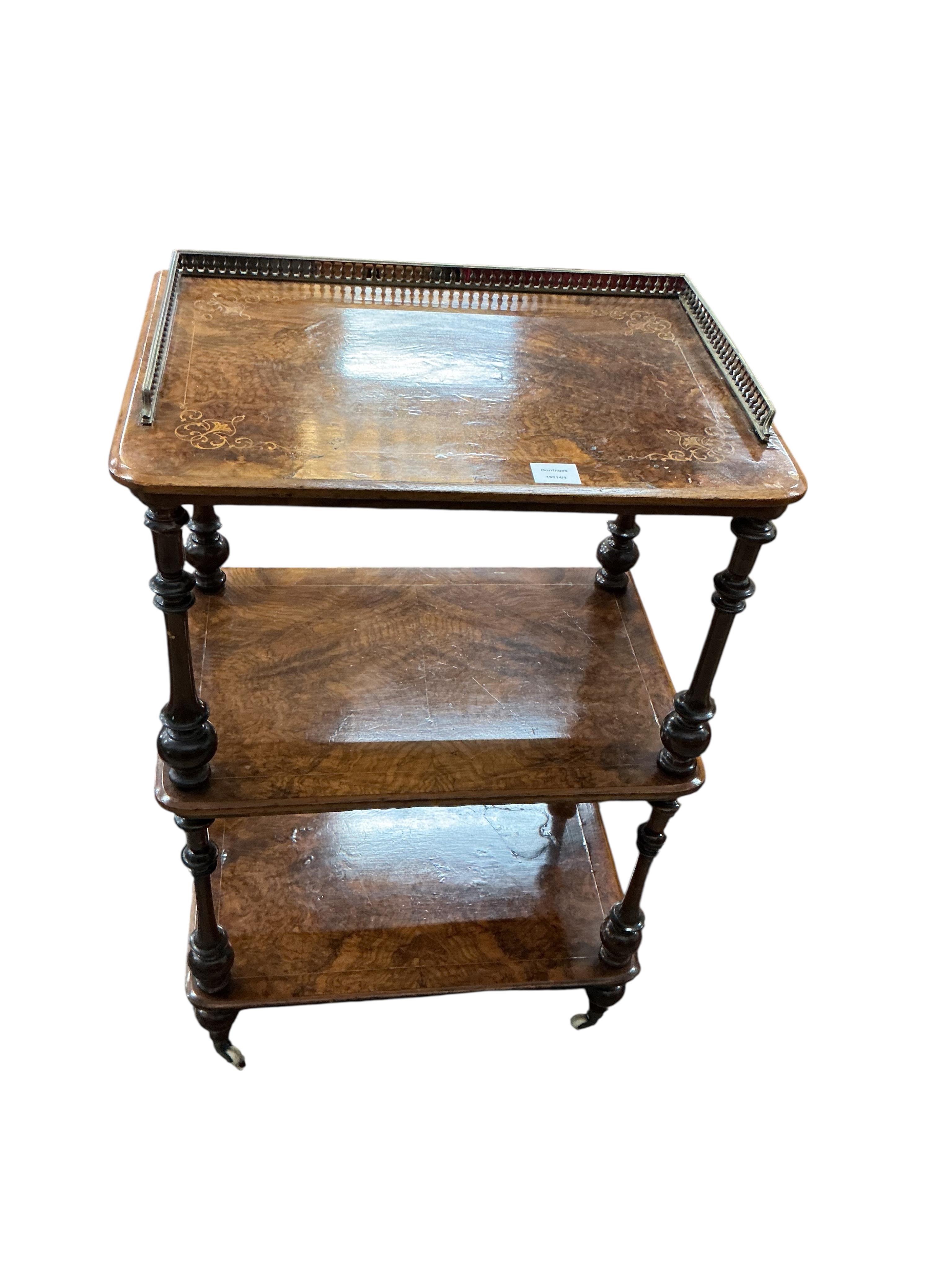 A Victorian walnut three tier whatnot, width 60cm, depth 40cm, height 95cm
